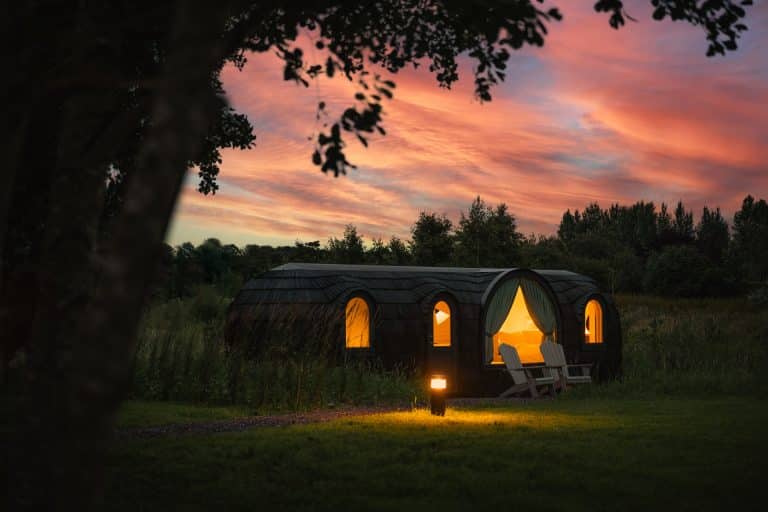 Ballygarry Estate cabin at night with red sky